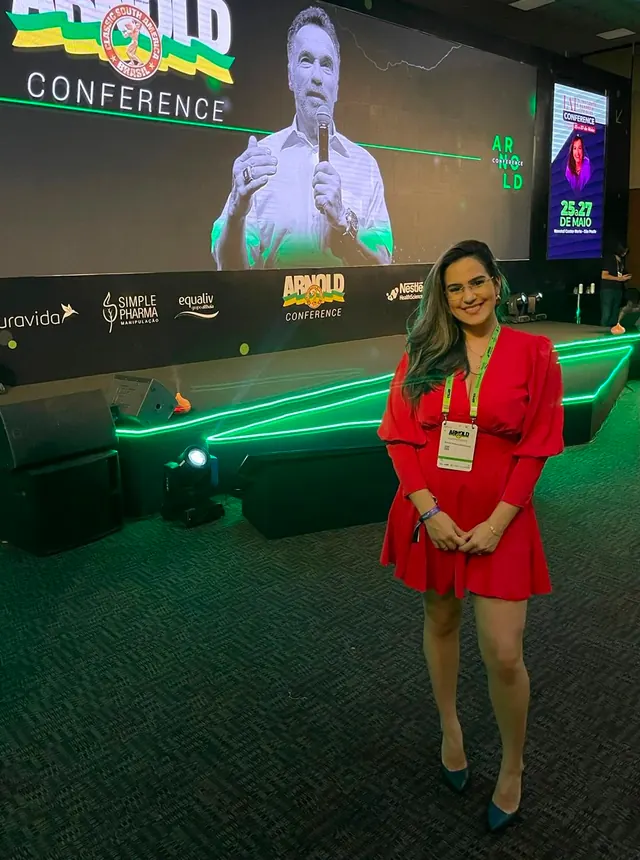 Raissa no auditório da Arnold Conference